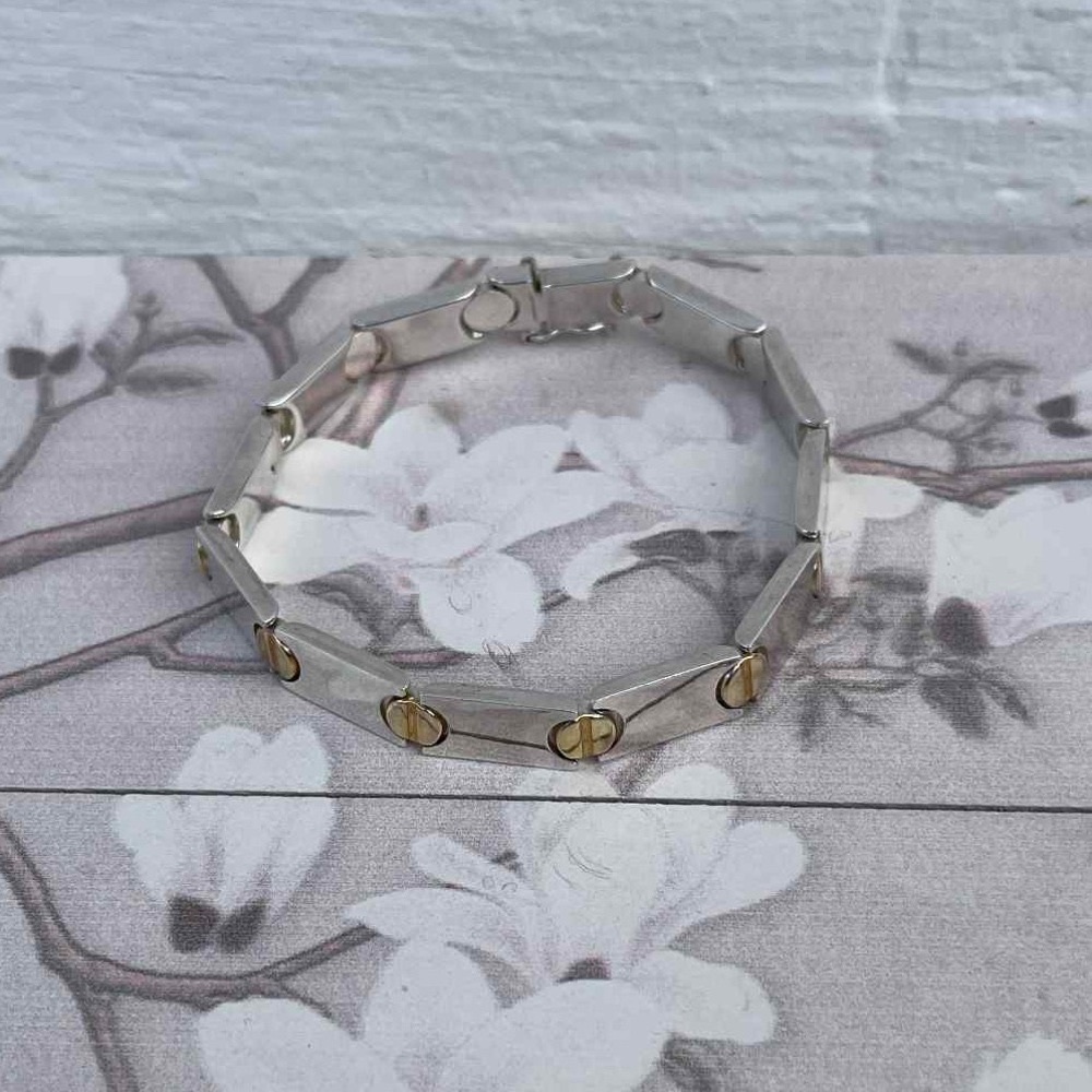 Elegant Silver and Gold Bracelet
